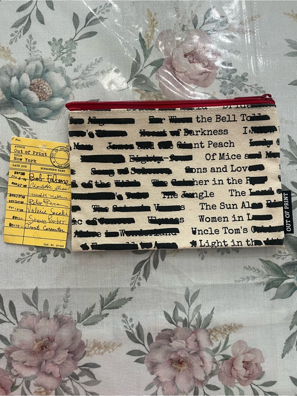 Out of Print Cream Canvas Pouch with Red Zipper
